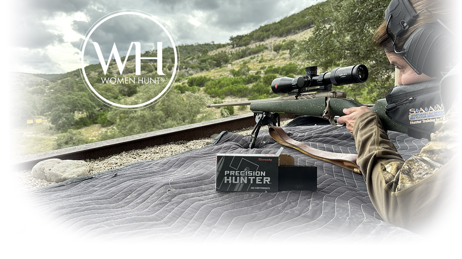 Woman shooting a rifle